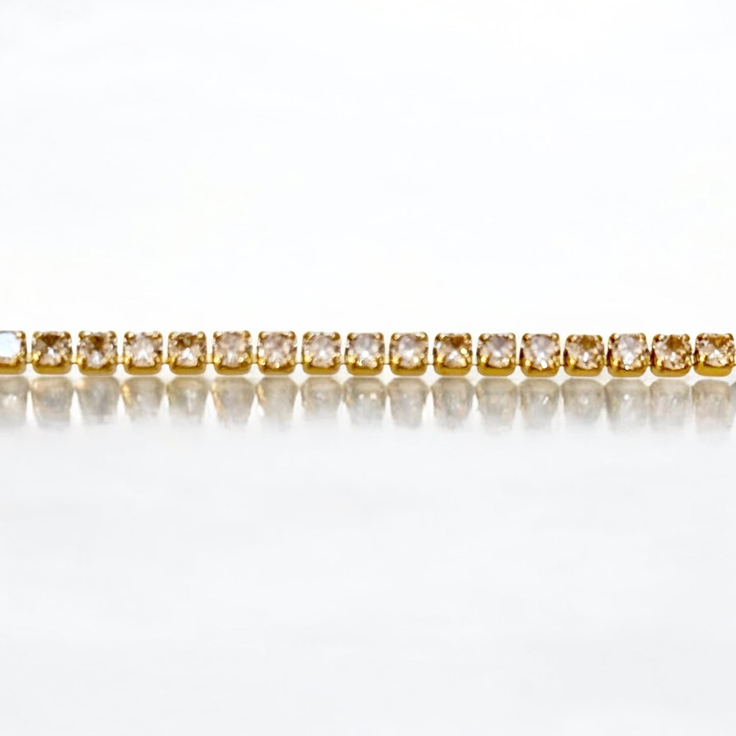 Tennisarmband mit kleinen weissen runden Zirkonia 18k Gelbgold vergoldet