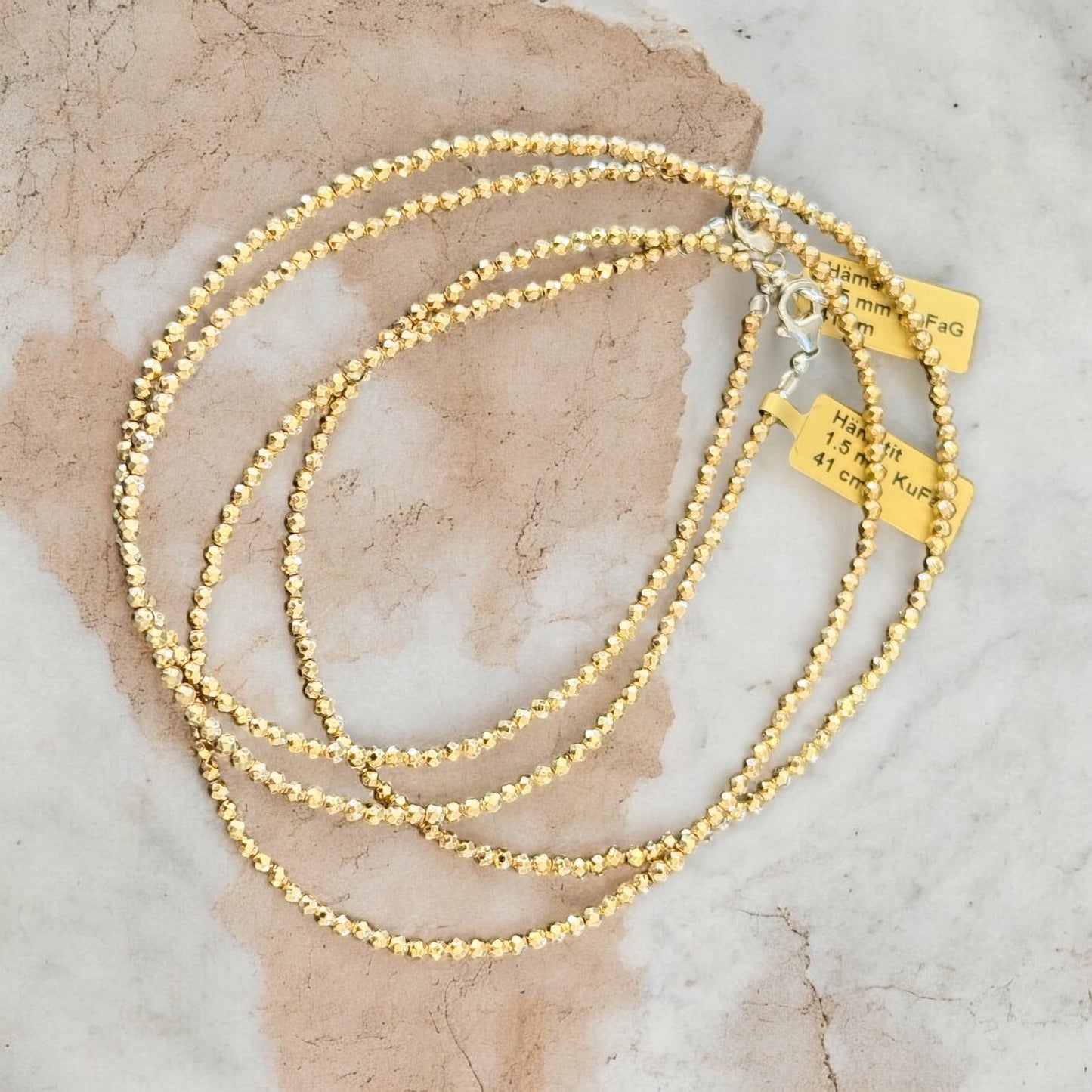 Halsketten aus Hämatit - Gold bedampft