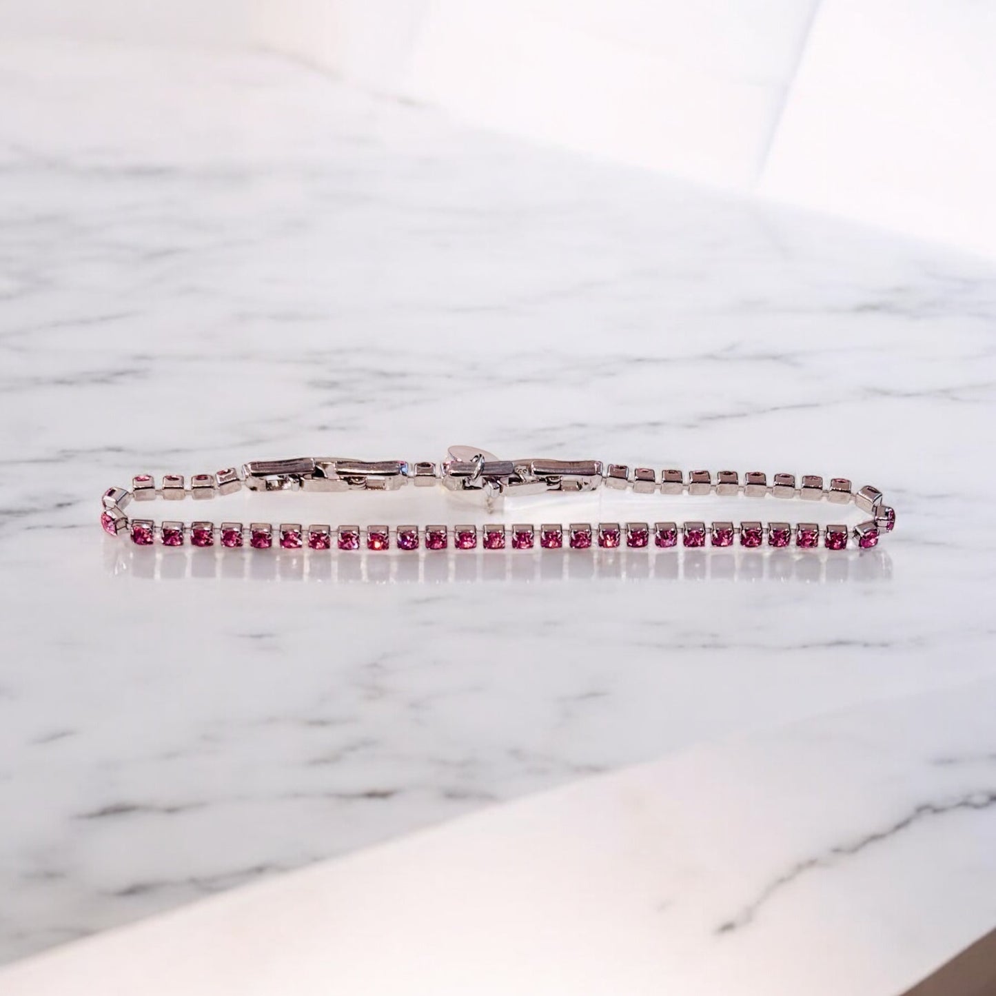 Tennisarmband mit Zirkonia / Rosa