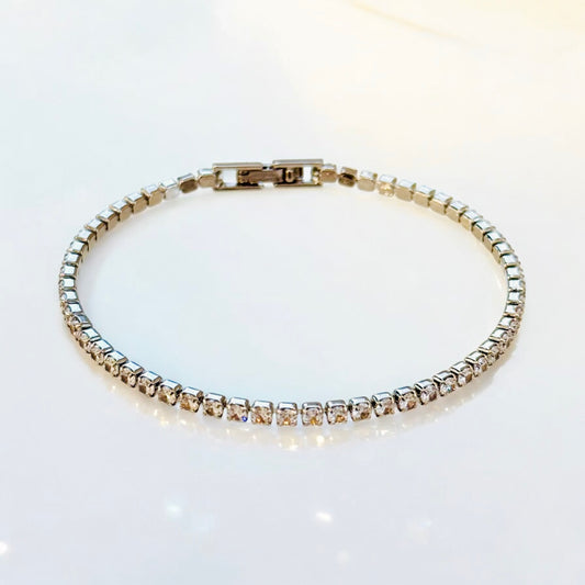 Tennisarmband mit kleinen weissen runden Zirkonia 18k Weissgold vergoldet