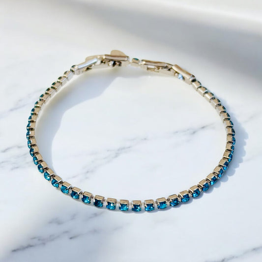 Tennisarmband mit Zirkonia / Türkisblau